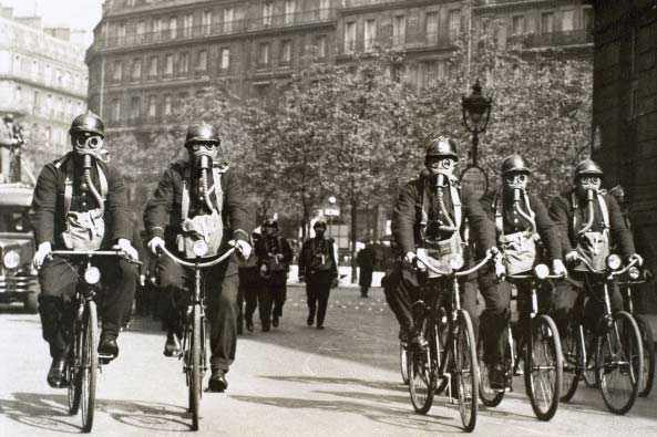 French police cycling in gas masks