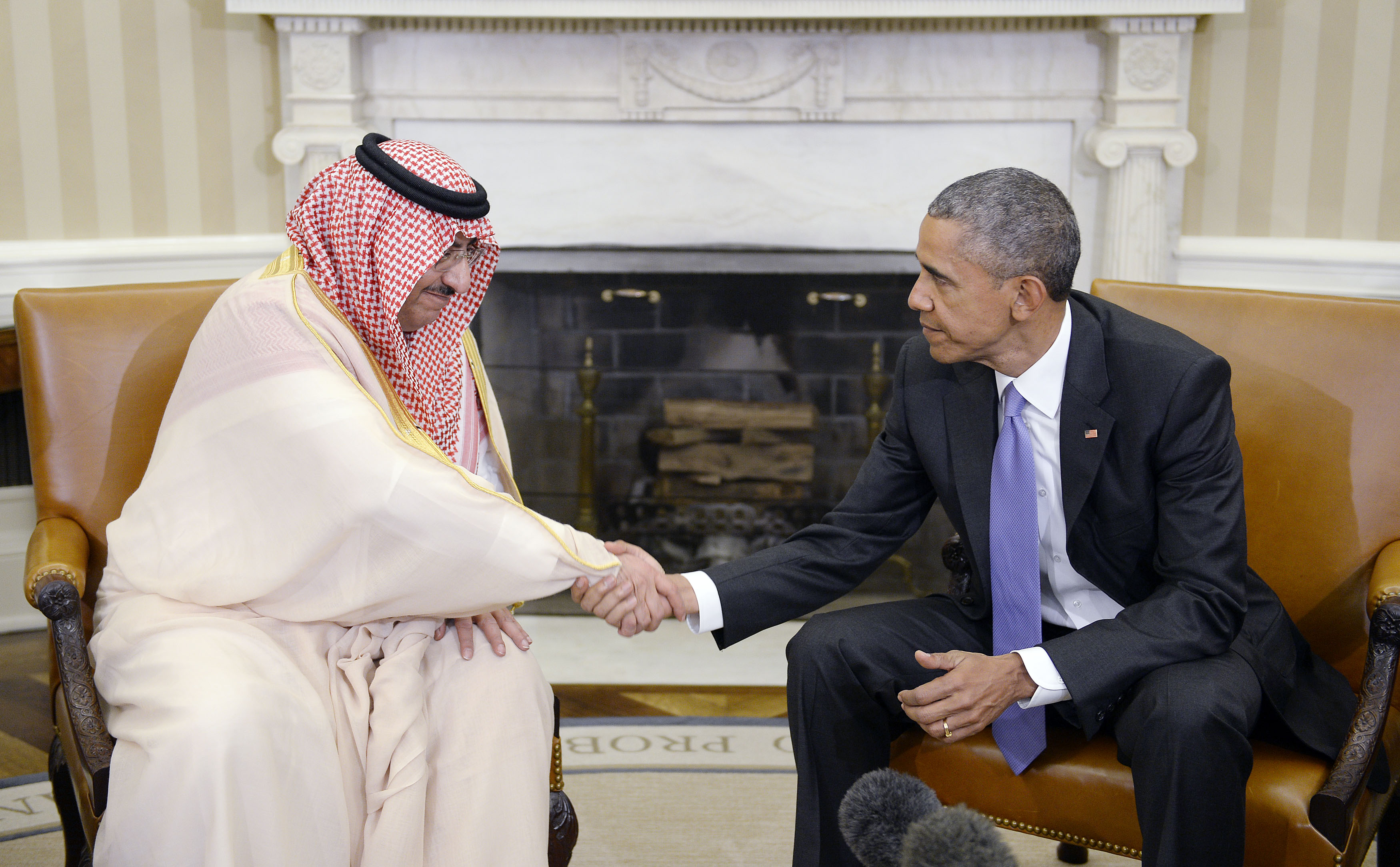 Popular with U.S. officials, MBN shakes hands with President Obama during the 2015 Arab Summit in Washington.